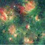 تلسکوپ فضایی اسپیتزر منطقه ای پرستاره با حبابهای در حال انفجار را رصد کرد